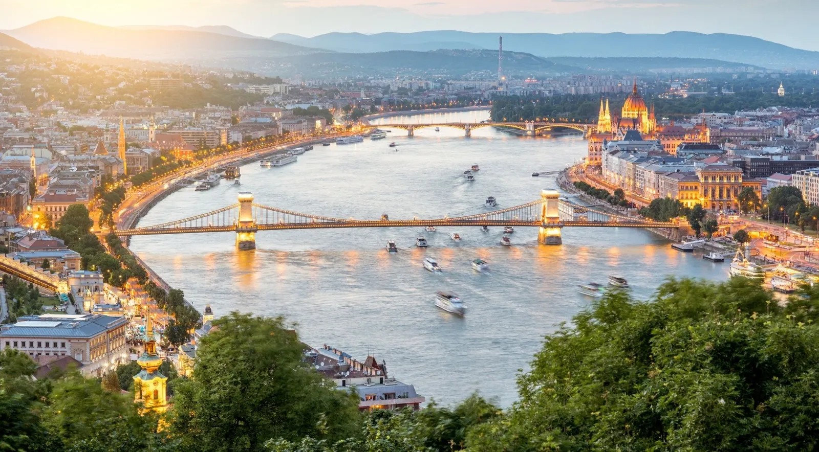 Panorama of the Danube bridges from the Buda hills with the Parliament on the far bank